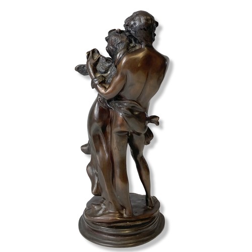 178 - A heavy solid Bronze sculpture of romantic couple. 
33cm Tall