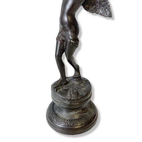 179 - A pair of 19th century Italian bronze candlesticks. Depicting Cherubs holding vases on shoulder. Sto... 