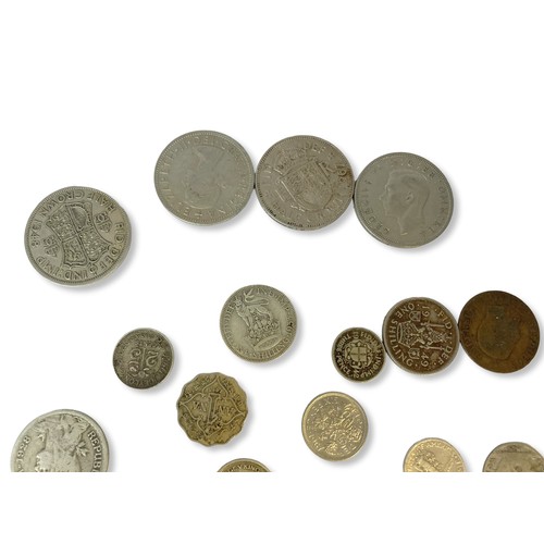 52 - A mixed collection of silver coins. Mainly 1st half 20th-century. Including 1934 Fiji six pence, 194... 