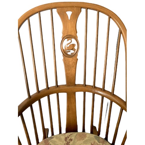 311 - Ercol Elm & Beech Swan Windsor Rocking Chair.