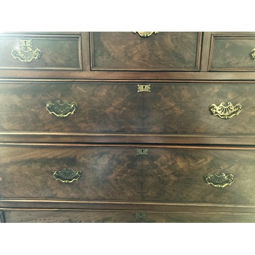 314 - A 19th-Century Mahogany Scotch Chest of Drawers. With carved finials. Square central drawer bordered... 