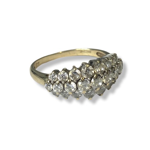 47 - A ladies 9Ct Gold & CZ ring. Set with rows of numerous graduating CZ's.
Size N
Weight - 2.69g