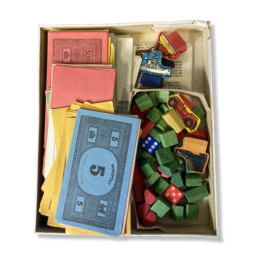 380 - A collection of vintage Board games, including Monopoly, Scrabble and Trivial Pursuit.