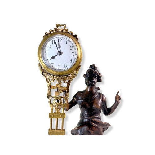 154 - Early 20th Century Junghans mystery clock. Spelter maiden holding aloft Gilt-metal clock.
34cm Tall