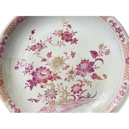 227 - A large Chinese Qianlong period porcelain Dish / charger. Hand-painted blossoming flowers in Famille... 