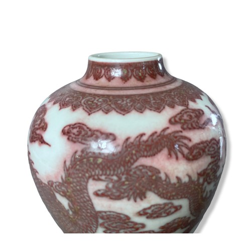 232 - A Chinese Copper Iron-red porcelain Vase. Painted Five-claw Dragons chasing a pearl amongst clouds, ... 