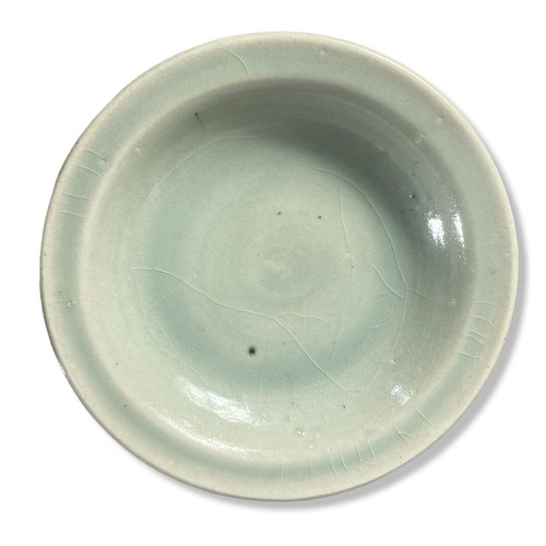 235 - A Chinese Celadon glaze Dish. Marked to base.
6.5 x 17.5 cm