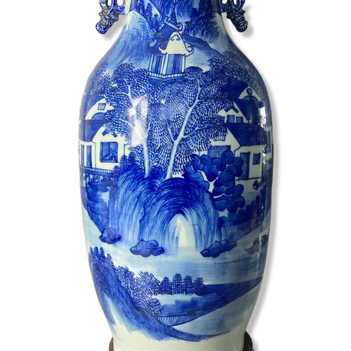 239 - A large 19th-century Qing Chinese porcelain landscape. vase. Underglaze cobalt painted landscape sce... 