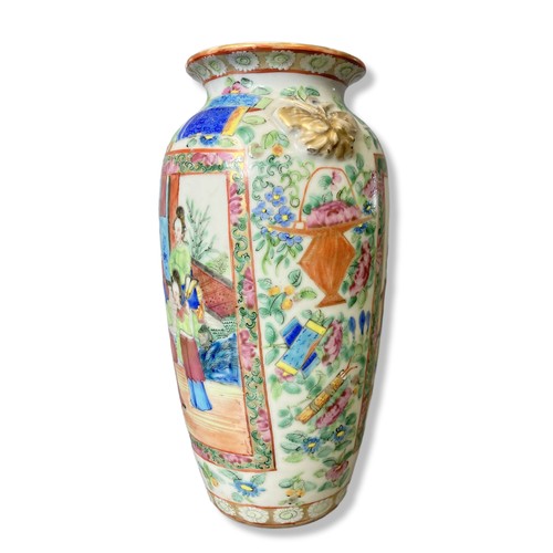 241 - A 19th-Century Chinese Famille Rose porcelain vase. Overglaze enamels painted panels with stylised F... 