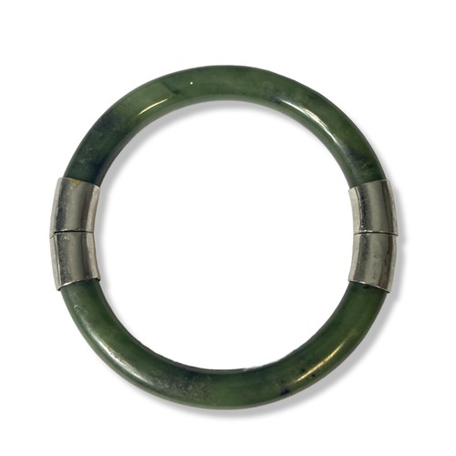 229 - A Chinese white metal & Jade hinged bangle.
7.5cm Diameter.