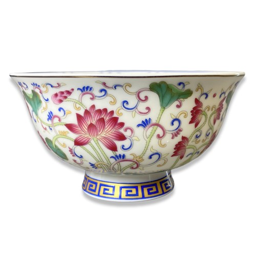 252 - A Chinese porcelain Lotus pattern bowl.
Marked to base.
6.5 x 12 cm