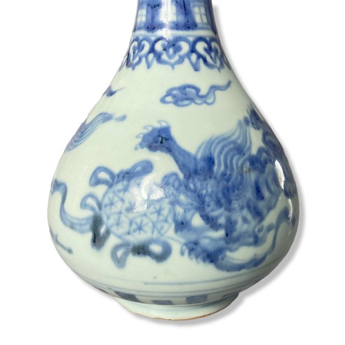 259 - A Chinese suantouping (garlic shape) porcelain vase. Hand painted with Buddhistic Lions playing with... 