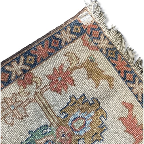 355 - A Persian carpet Camel Saddle. 
120 x 49cm