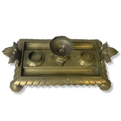 186 - An early 20th-century French brass Desk stand.
33cm long.
Missing Inkwells.