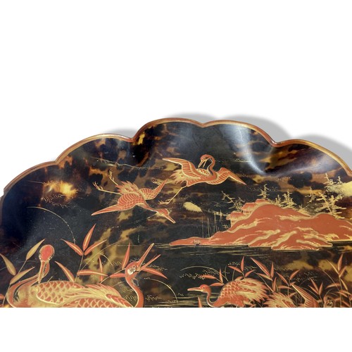 132 - Antique Japanese Tortoise shell dish. Decorated with varois Cranes in landscape scenes. 
7.5 x 35cm