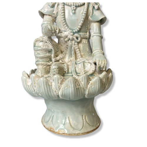 264 - A Chinese Qingbai Celadon porcelain Guanyin. Seated on a Lotus throne. Adorned with beaded jewellery... 