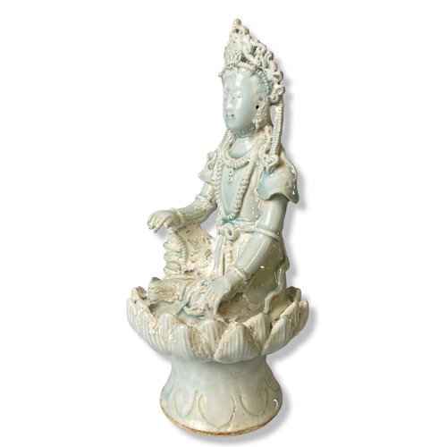 264 - A Chinese Qingbai Celadon porcelain Guanyin. Seated on a Lotus throne. Adorned with beaded jewellery... 