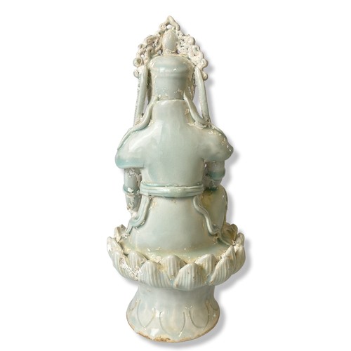 264 - A Chinese Qingbai Celadon porcelain Guanyin. Seated on a Lotus throne. Adorned with beaded jewellery... 