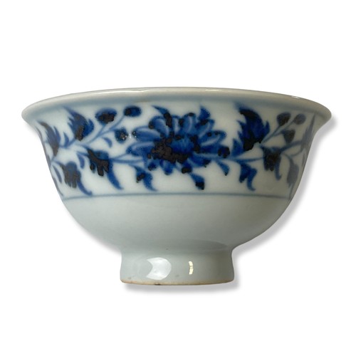 268 - A Chinese porcelain Ming type Tea bowl. Painted with scrolling floral design. Painted boy to interio... 