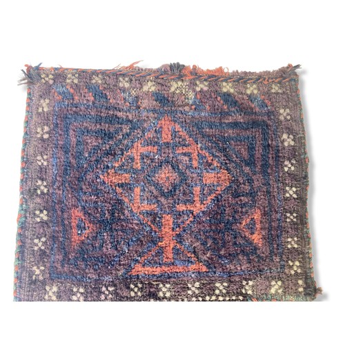 355A - An early 20th-century Persian carpet Salt Bag (Namakdan).
47 x 35 cm