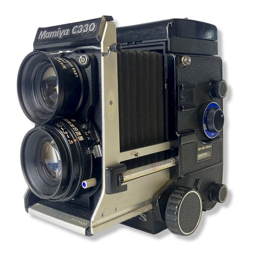 85 - A Mamiya C330 Professional S' TLR camera. With manual.