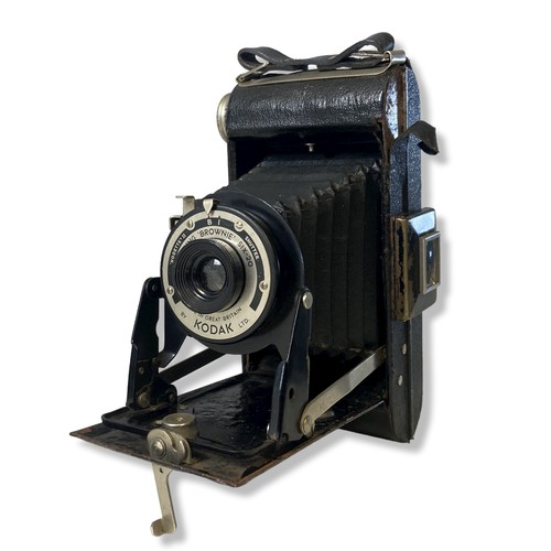 72 - Three vintage folding cameras, including a Nettar Velio, A telma Zeiss Ikon and a Kodak folding Brow... 