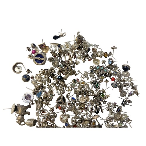 8 - A large quantity of Silver odd earrings.
Gross weight Approx 160 grams.