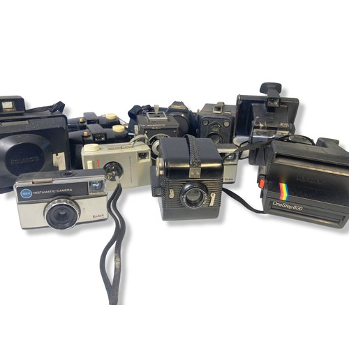 90 - A large collection of vintage cameras. Includes Box, 35mm and Polaroids.
13 in total.