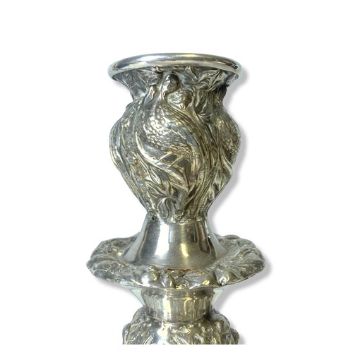 150A - Antique pair of cast Silver plate candlesticks. Relief stylised exotic Birds amongst foliage.
26cm T... 