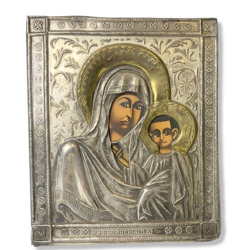 181 - A Russian silver plate Icon. Depicting Smolensk Mother of God.
13 x 10.5cm