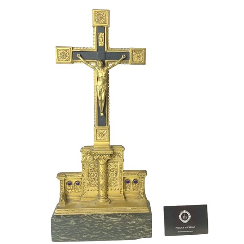 183 - A large Gilt metal on Marble Crucifix (Corpus Christi). Inset with blue cabochon.
42 x 18.5 cm