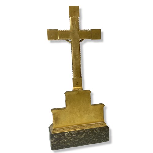 183 - A large Gilt metal on Marble Crucifix (Corpus Christi). Inset with blue cabochon.
42 x 18.5 cm