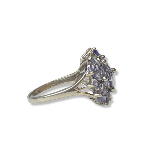 23 - 9 carat white gold Tanzanite & Diamond ring .
UK Size 0
Weight 4.49 g