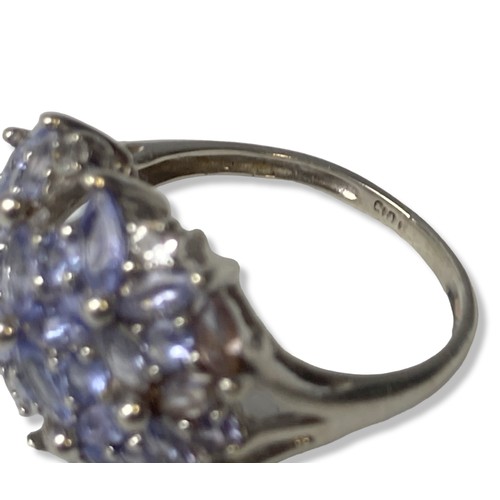 23 - 9 carat white gold Tanzanite & Diamond ring .
UK Size 0
Weight 4.49 g