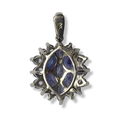 26 - A 9 Carat white Gold and Tanzanite pendant.
Measures 20 x 12mm.
Gross weight - 1.64 grams