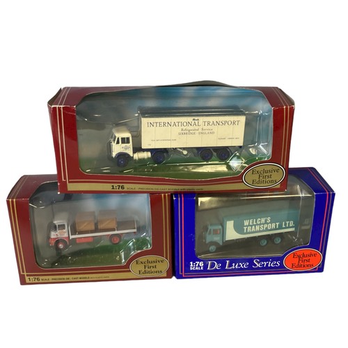 21 - A collection of Boxed Diecast model Lorries & tractors. Includes Gilbow & Lledo