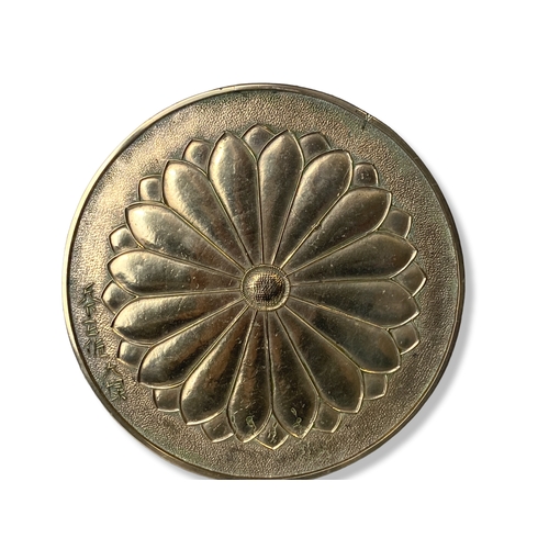 112 - A Chinese polished Bronze hand Mirror. Decorated with a blossoming Lotus flower. 
26.5cm X 18cm