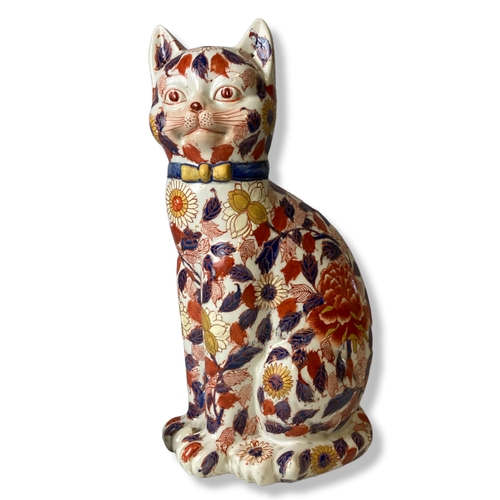 173 - A large Japanese Imari painted porcelain cat. Signed to base. 
35cm Tall