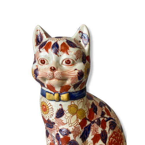 173 - A large Japanese Imari painted porcelain cat. Signed to base. 
35cm Tall