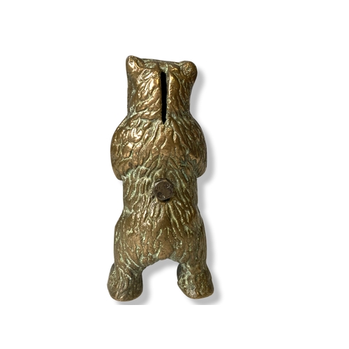 158 - A vintage Brass bear money box. 
15cm tall