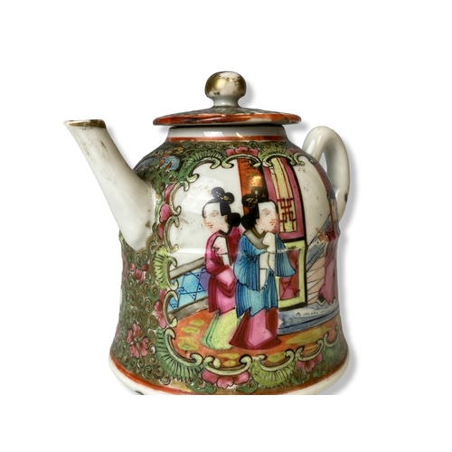 203 - A Chinese export Famille Rose Canton Teapot. Qing dynasty. Hand painted overglaze enamels. 
10.5 x 1... 