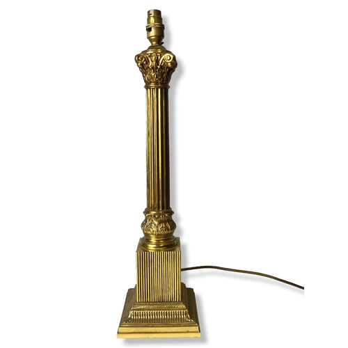 168 - A large Brass Corinthian Column table lamp.
54cm Tall