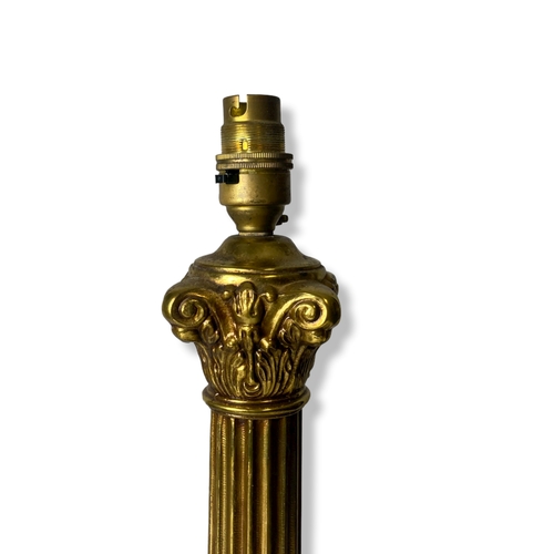 168 - A large Brass Corinthian Column table lamp.
54cm Tall