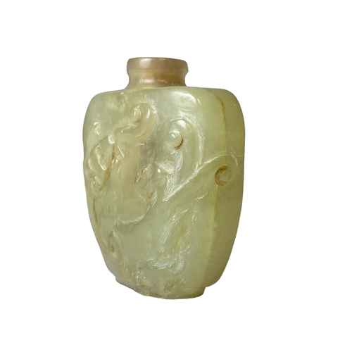 111 - A carved Chinese Jade snuff bottle. 
5 x 4.5 cm