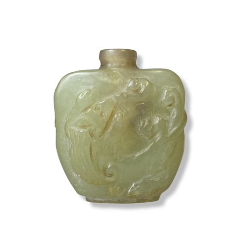 111 - A carved Chinese Jade snuff bottle. 
5 x 4.5 cm