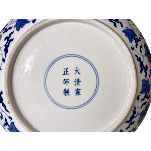 206 - A Chinese porcelain hand painted Blue & white Dish.  With Yongzheng reign mark. Depicting Numerous 5... 