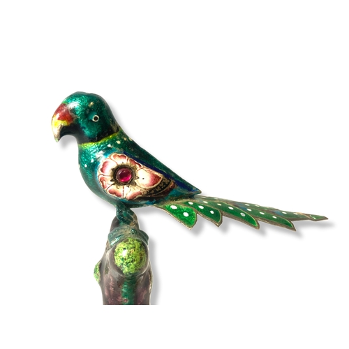 1 - An early 20th-century Indian Enamel gem-set & silver bird figurine. Depicting a Parrot perched on tr... 