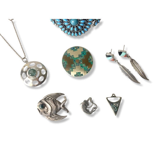 17 - A collection of Mexican & Navajo style jewellery. Including a Taxco 925 silver Geometric pattern bro... 