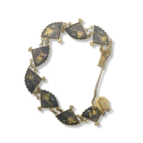 18 - A Siam silver Damascene bracelet together with a Japanese Shakudo necklace and bracelet.