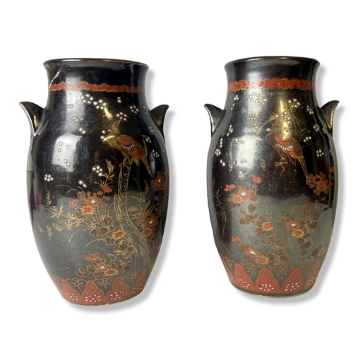 174 - A pair of large hand painted Japanese pottery vases.
28cm Tall